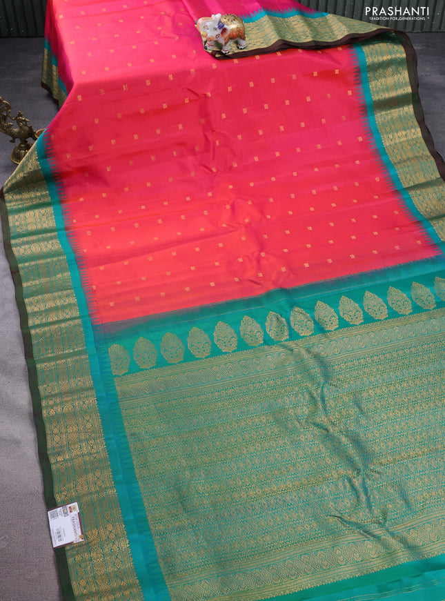 Pure gadwal silk saree pink and teal green with allover zari woven buttas and temple design zari woven border