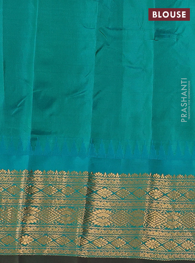 Pure gadwal silk saree pink and teal green with allover zari woven buttas and temple design zari woven border