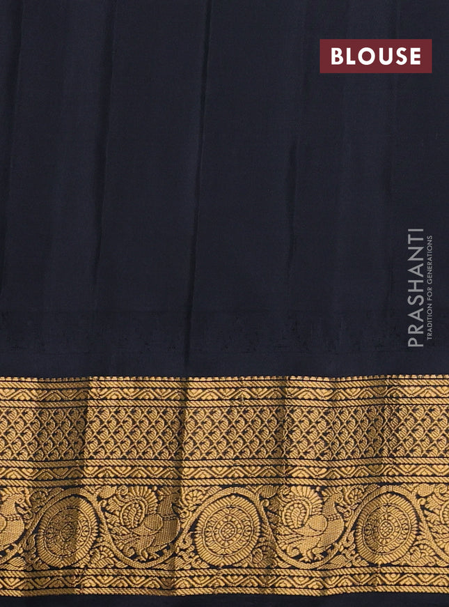 Pure gadwal silk saree light blue and black with paisley zari woven buttas and temple design zari woven border