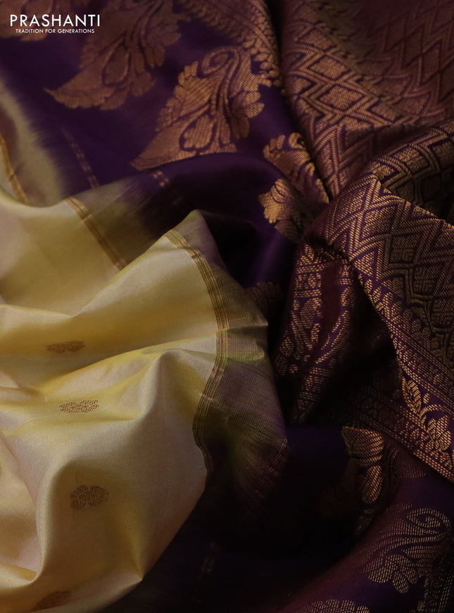 Pure gadwal silk saree pale yellow and wine shade with floral zari woven buttas and temple design zari woven border