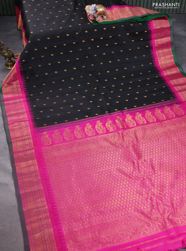 Pure gadwal silk saree black and magenta pink with allover zari woven buttas and temple design zari woven border