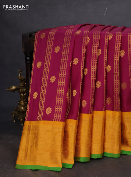 Pure gadwal silk saree dark magenta pink and mustard yellow with allover zari weaves & Buttas and rich floral zari woven korvai border