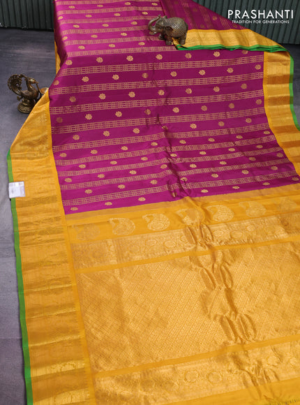 Pure gadwal silk saree dark magenta pink and mustard yellow with allover zari weaves & Buttas and rich floral zari woven korvai border