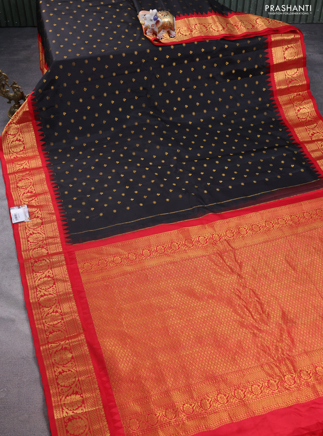 Pure gadwal silk saree black and red with allover zari woven buttas and temple design zari woven border