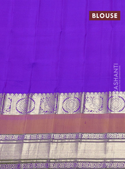 Pure gadwal silk saree cs blue and violet with allover zari weaves & buttas and long temple design rettapet zari woven border