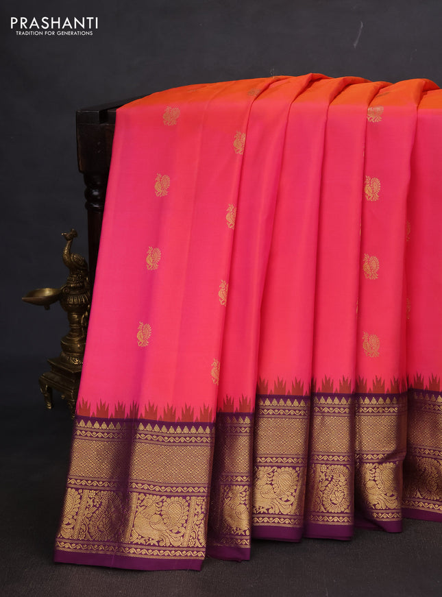 Pure gadwal silk saree dual shade of pinkish orange and deep purple with annam zari woven buttas and temple design zari woven annam border