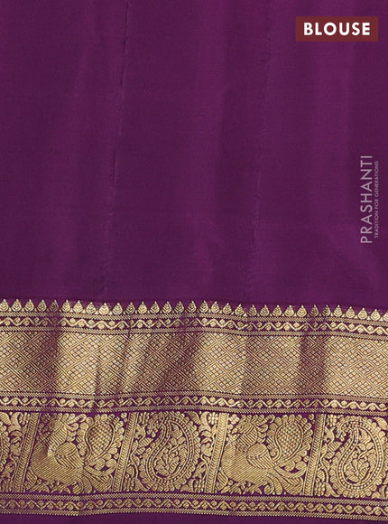 Pure gadwal silk saree dual shade of pinkish orange and deep purple with annam zari woven buttas and temple design zari woven annam border