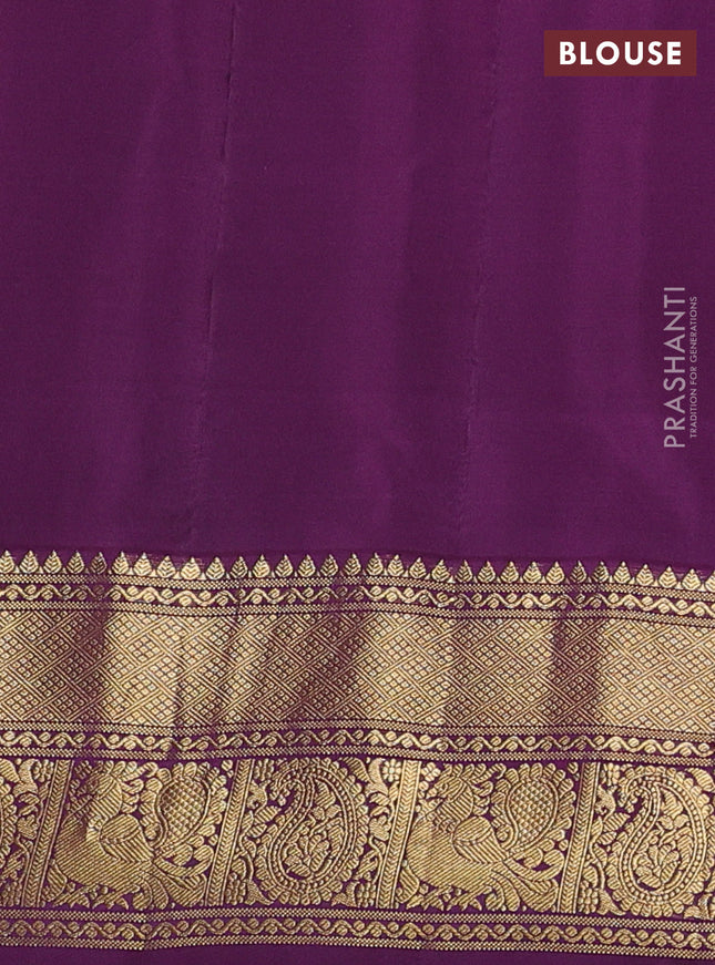 Pure gadwal silk saree dual shade of pinkish orange and deep purple with annam zari woven buttas and temple design zari woven annam border