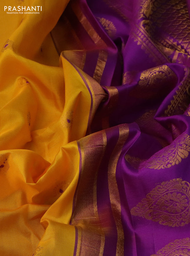 Pure gadwal silk saree yellow and purple with annam zari woven buttas and long temple design zari woven border