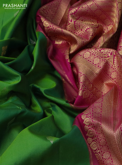 Pure gadwal silk saree parrot green and pink with silver zari woven Buttas and long zari woven korvai border