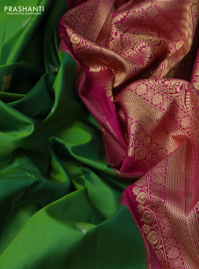 Pure gadwal silk saree parrot green and pink with silver zari woven Buttas and long zari woven korvai border