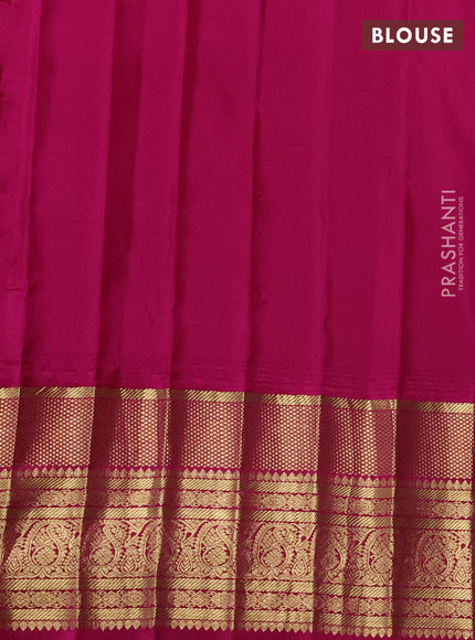 Pure gadwal silk saree parrot green and pink with silver zari woven Buttas and long zari woven korvai border