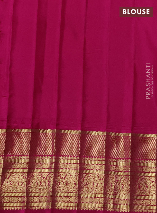 Pure gadwal silk saree parrot green and pink with silver zari woven Buttas and long zari woven korvai border