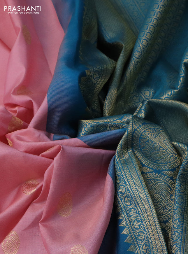 Pure gadwal silk saree peach pink shade and teal blue with zari woven buttas and rich zari woven korvai border