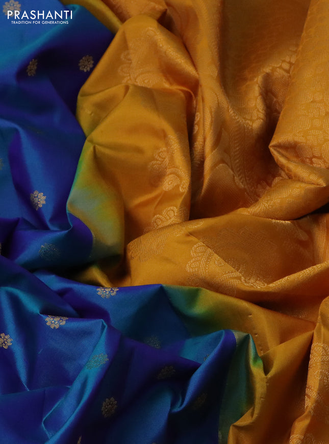 Pure gadwal silk saree dual shade of blue and mustard yellow with zari woven buttas and rich zari woven korvai border