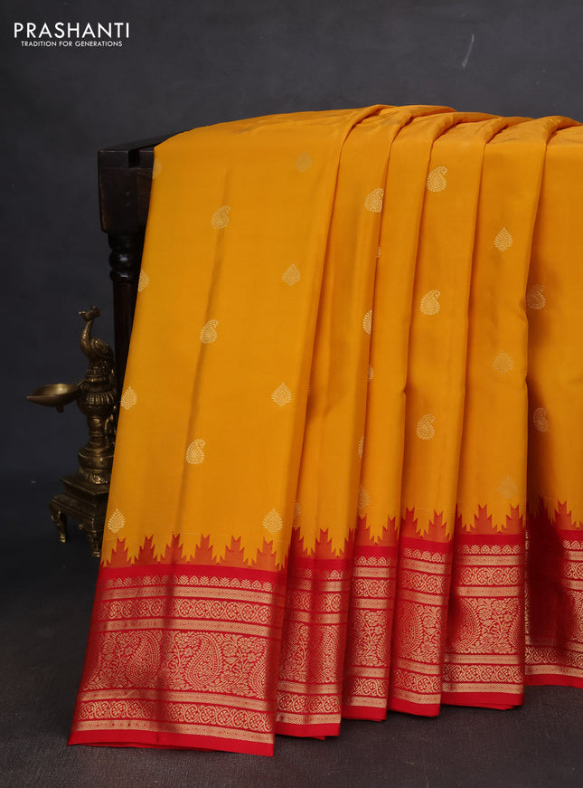 Pure gadwal silk saree yellow and red with zari woven buttas and temple design zari woven border