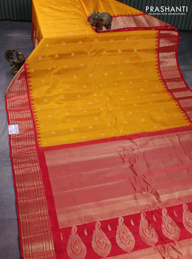 Pure gadwal silk saree yellow and red with zari woven buttas and temple design zari woven border