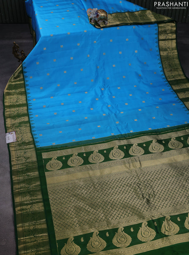 Pure gadwal silk saree light blue and green with annam zari woven buttas and rich zari woven korvai border