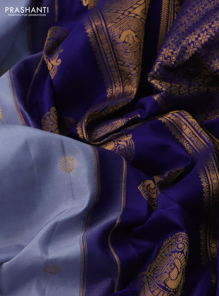 Pure gadwal silk saree grey and blue with zari woven buttas and temple design zari woven korvai border