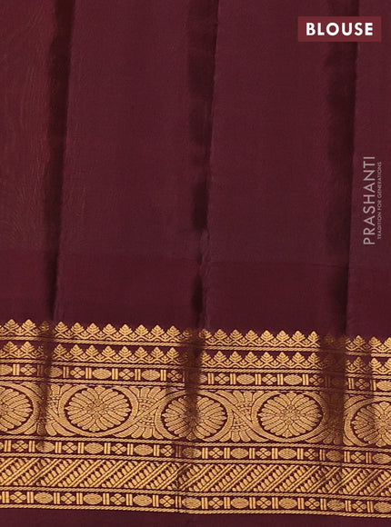 Pure gadwal silk saree light green and deep maroon with zari woven buttas and temple design zari woven korvai border