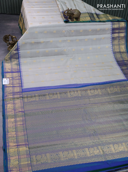 Pure gadwal silk saree pastel grey and dual shade of bluish green with annam zari woven buttas and temple design zari woven border