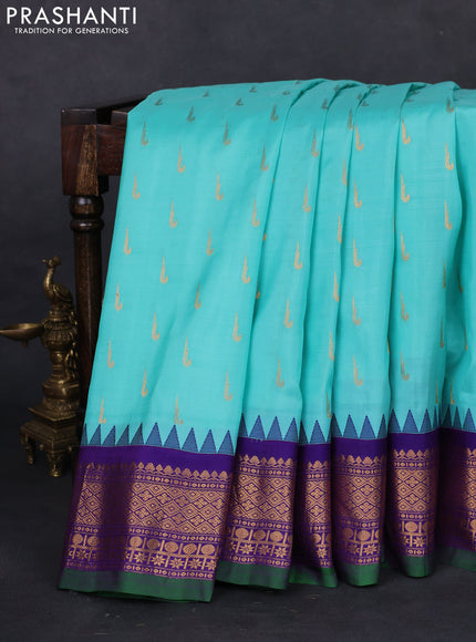 Pure gadwal silk saree teal blue and violet shade with allover muniya buttas and temple design zari woven border