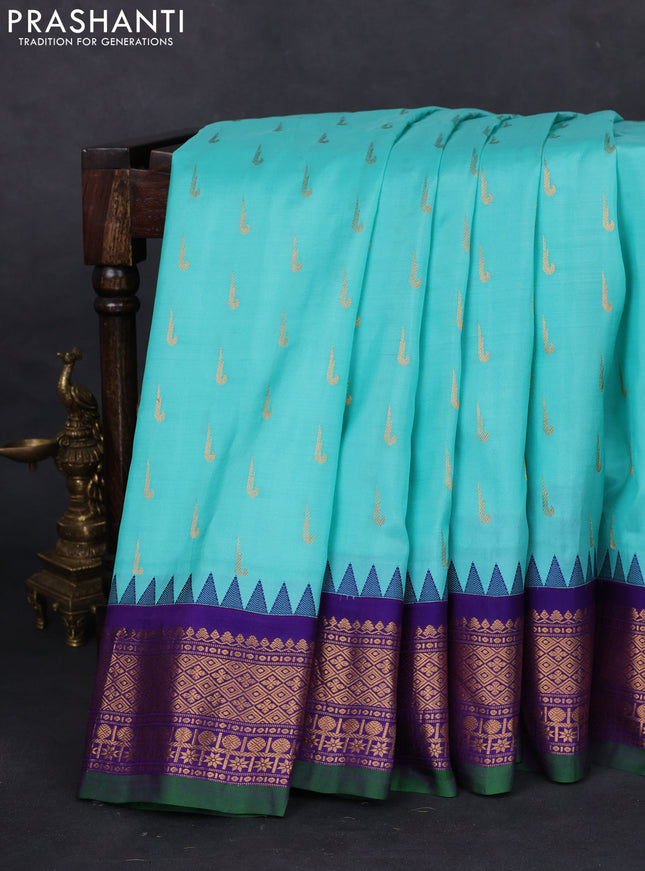 Pure gadwal silk saree teal blue and violet shade with allover muniya buttas and temple design zari woven border