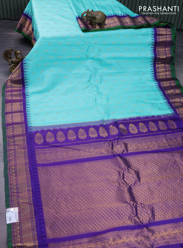 Pure gadwal silk saree teal blue and violet shade with allover muniya buttas and temple design zari woven border