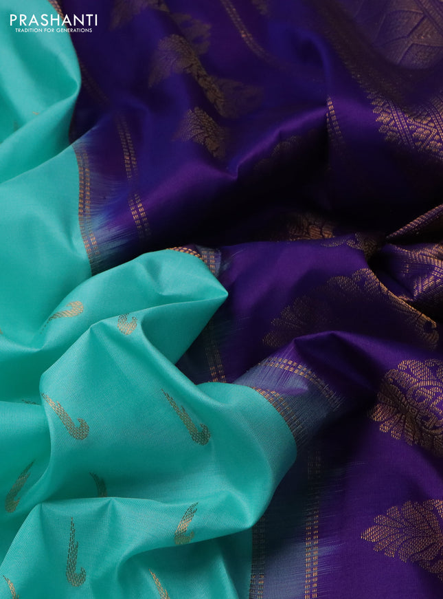 Pure gadwal silk saree teal blue and violet shade with allover muniya buttas and temple design zari woven border