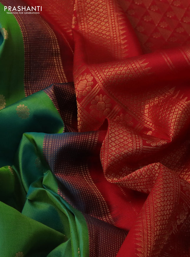 Pure gadwal silk saree dual shade of green and red with floral zari woven buttas and temple design zari woven border