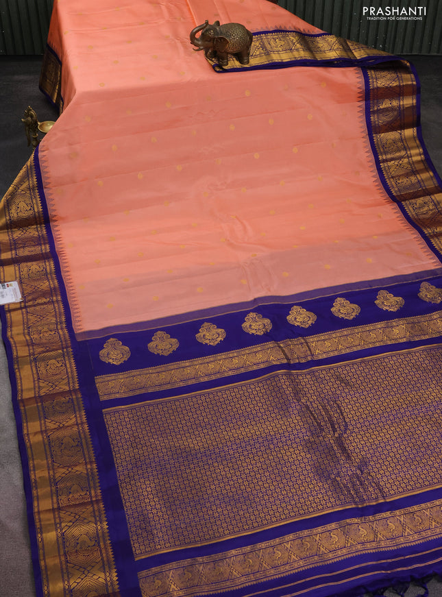 Pure gadwal silk saree peach orange and blue with zari woven buttas and temple design zari woven border