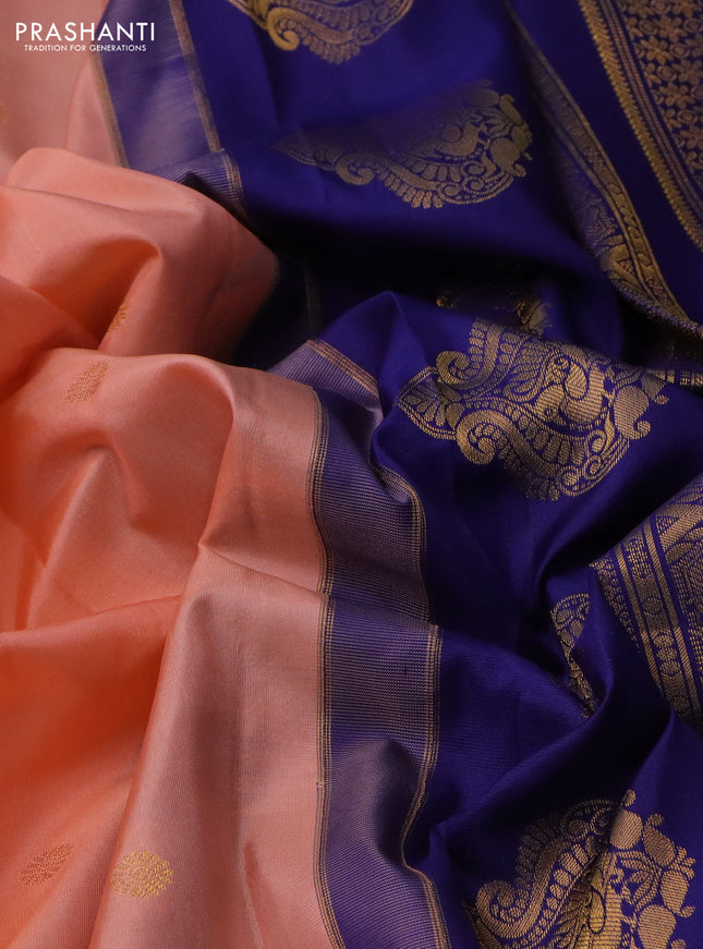 Pure gadwal silk saree peach orange and blue with zari woven buttas and temple design zari woven border