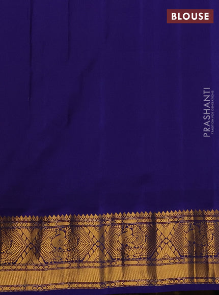 Pure gadwal silk saree peach orange and blue with zari woven buttas and temple design zari woven border