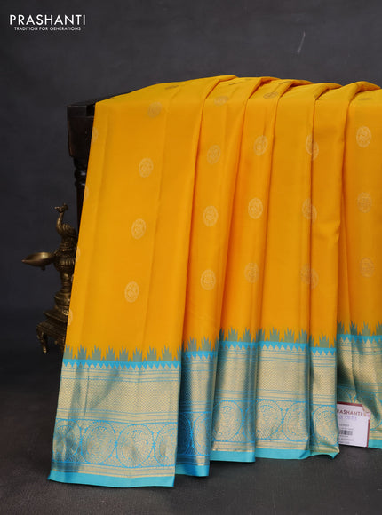 Pure gadwal silk saree yellow and teal blue with zari woven buttas and temple design zari woven border