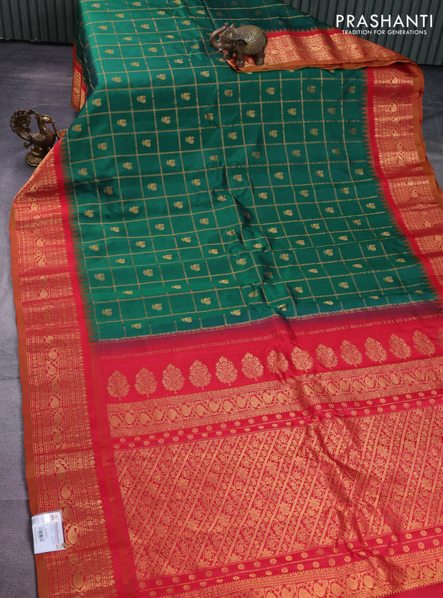 Pure gadwal silk saree greeb and red with allover zari checks & annam buttas and temple design zari woven korvai border