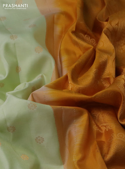 Pure gadwal silk saree off white and mustard yellow with floral zari woven buttas and temple design zari woven border