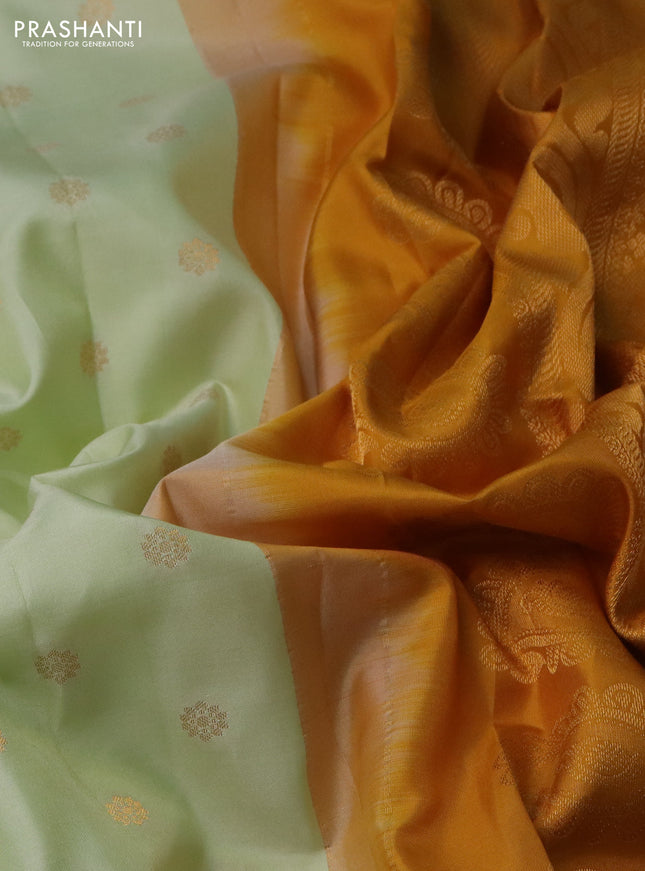 Pure gadwal silk saree off white and mustard yellow with floral zari woven buttas and temple design zari woven border