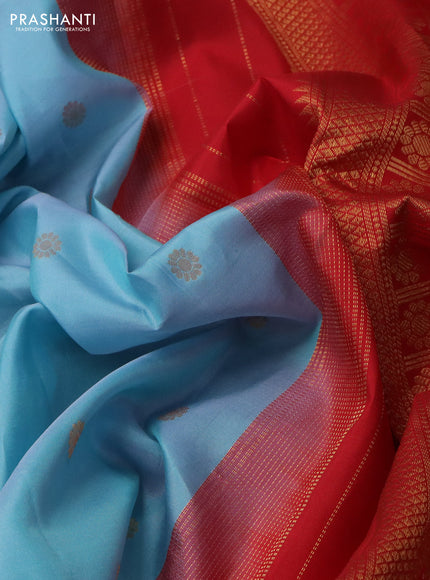 Pure gadwal silk saree light blue and red with floral zari woven buttas and temple design zari woven border