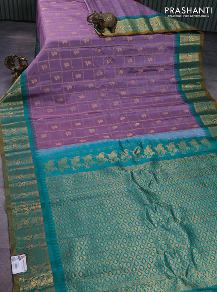 Pure gadwal silk saree pastel lavender and teal green with allover zari checks & floral buttas and temple design zari woven korvai border