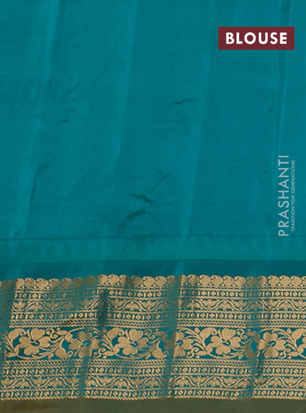 Pure gadwal silk saree pastel lavender and teal green with allover zari checks & floral buttas and temple design zari woven korvai border