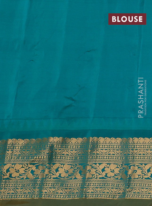Pure gadwal silk saree pastel lavender and teal green with allover zari checks & floral buttas and temple design zari woven korvai border