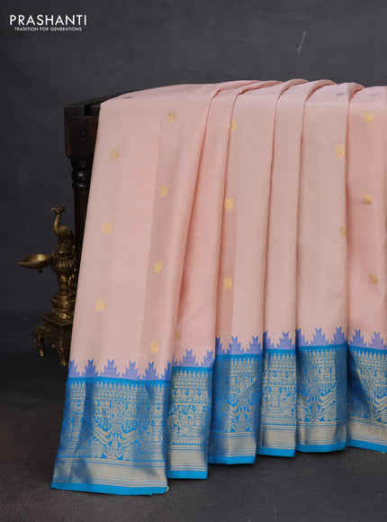 Pure gadwal silk saree pastel peach and dual shade of teal blue with annam zari woven buttas and temple design zari woven border