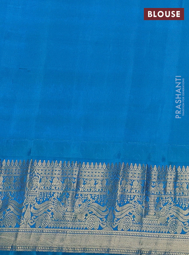 Pure gadwal silk saree pastel peach and dual shade of teal blue with annam zari woven buttas and temple design zari woven border
