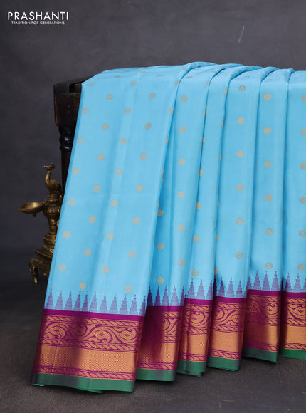Pure gadwal silk saree light blue and purple with allover zari woven buttas and temple design zari woven border