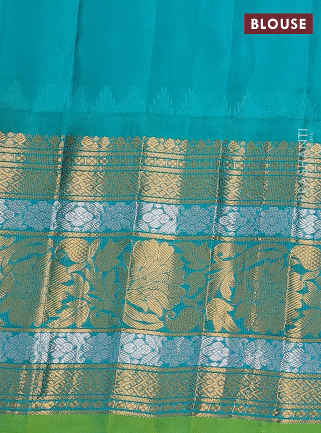 Pure gadwal silk saree pastel peach pink and teal green with floral zari woven buttas and long temple design zari woven border