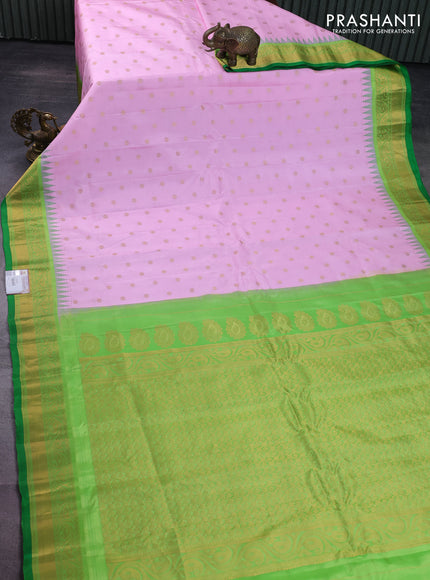 Pure gadwal silk saree light pink and green with floral zari woven buttas and temple design zari woven border
