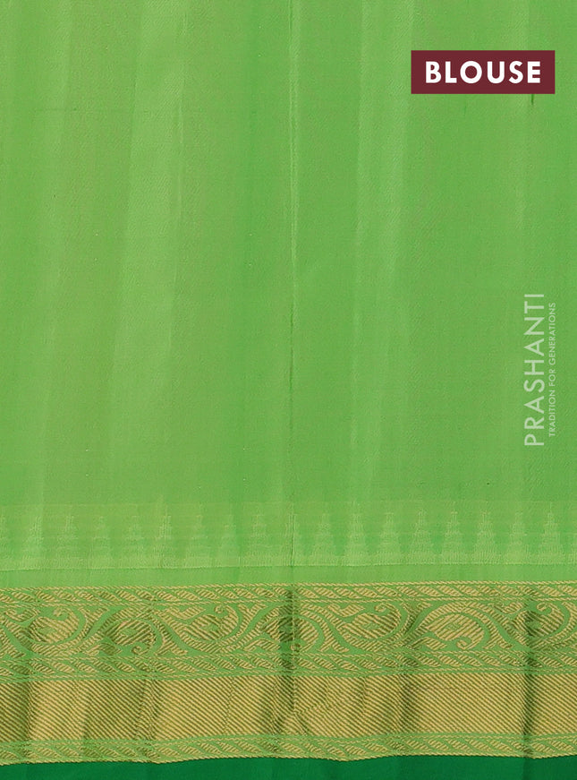 Pure gadwal silk saree light pink and green with floral zari woven buttas and temple design zari woven border
