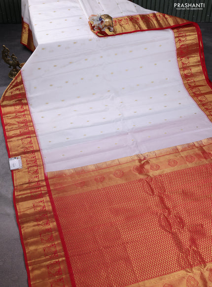 Pure gadwal silk saree off white and red with zari woven buttas and temple design zari woven border