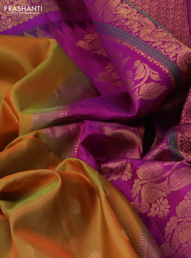 Pure gadwal silk saree dual shade of mustard and purple with floral zari woven buttas and temple design zari woven border