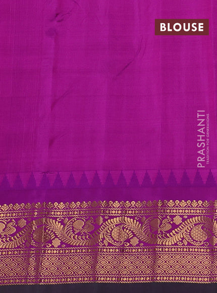 Pure gadwal silk saree dual shade of mustard and purple with floral zari woven buttas and temple design zari woven border